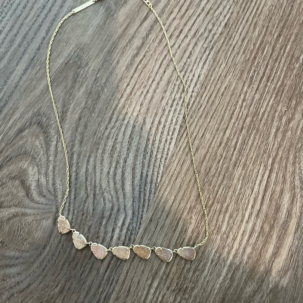 Kendra Scott Gold and Cream Necklace with Elegant Pendants